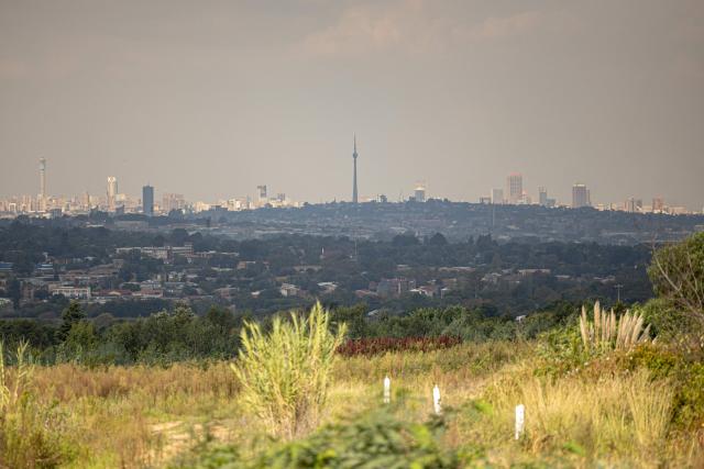 A general view of the Johannesburg skyline from Braamfischerville on April 1, 2026. (Photo by EMMANUEL CROSET / AFP)