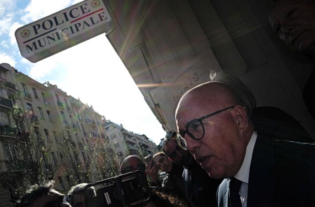 Union des droites pour la Republique (UDR) leader and newly elected Nice mayor Eric Ciotti (R) addresses the media as he visits the Rue Trachel neighborhood during a police operation to combat drug trafficking, in Nice souteastern France, on April 1, 2026. (Photo by Valery HACHE / AFP)