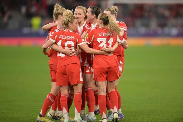 Bayern Munich's team celebrates the 1-1 by Bayern Munich's Icelandic defender #04 Glodis Viggosdottir during the UEFA Women's Champions League, Quarter Final second-leg football match between FC Bayern Munich and Manchester United in Munich on April, 1 2026. (Photo by Markus FISCHER / AFP)