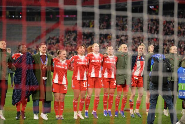 Bayern Munich's team celebrates after the UEFA Women's Champions League, Quarter Final second-leg football match between FC Bayern Munich and Manchester United in Munich on April, 1 2026. (Photo by Markus FISCHER / AFP)