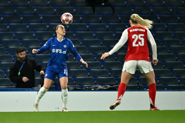 Chelsea's English defender #22 Lucy Bronze heads the ball during the UEFA Women's Champions League Quarter Final second-leg football match between Chelsea and Arsenal at Stamford Bridge in London on April 1, 2026. (Photo by Ben STANSALL / AFP)