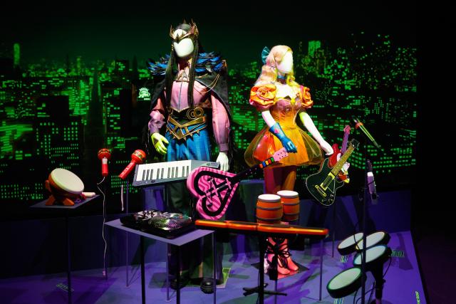 This photograph shows toy music instruments at the "Video Games & Music" exhibition at la Philharmonie de Paris, in Paris on April 1, 2026. The exhibition will be open from April 2 to November 1, 2026. (Photo by GEOFFROY VAN DER HASSELT / AFP)