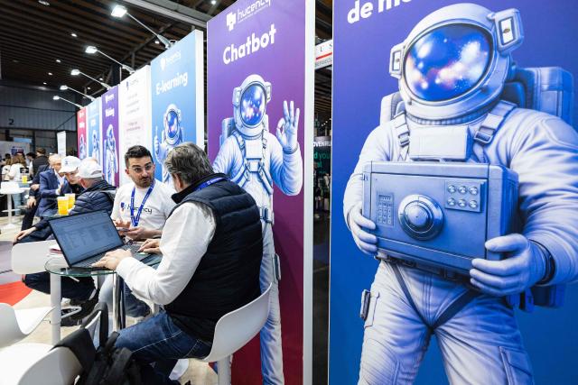Visitors take part in the 18th edition of the "InCyber" Forum, an international cyber security event, at the Grand Palais in Lille, northern France on April 1, 2026. The forum, which brings together the entire cybersecurity and “trusted digital” ecosystem, runs until April 2, 2026. (Photo by Sameer Al-DOUMY / AFP)