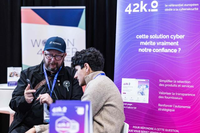 Visitors take part in the 18th edition of the "InCyber" Forum, an international cyber security event, at the Grand Palais in Lille, northern France on April 1, 2026. The forum, which brings together the entire cybersecurity and “trusted digital” ecosystem, runs until April 2, 2026. (Photo by Sameer Al-DOUMY / AFP)