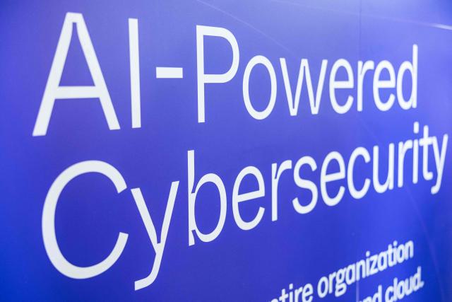 This photograph shows a poster of AI-Powered Cybersecurity during the 18th edition of the "InCyber" Forum, an international cyber security event, at the Grand Palais in Lille, northern France on April 1, 2026. The forum, which brings together the entire cybersecurity and “trusted digital” ecosystem, runs until April 2, 2026. (Photo by Sameer Al-DOUMY / AFP)