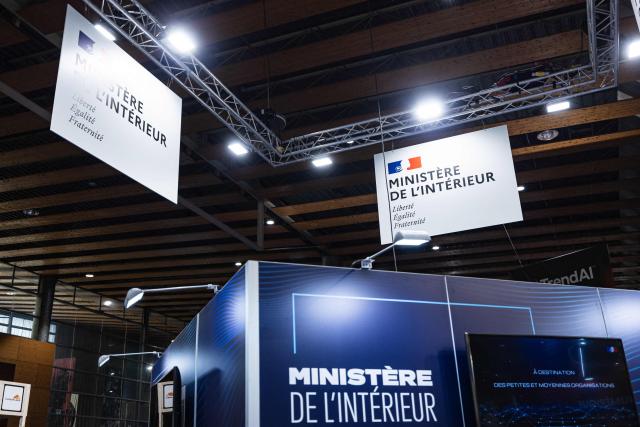 This photograph shows the stand of the Interior Ministry during the 18th edition of the "InCyber" Forum, an international cyber security event, at the Grand Palais in Lille, northern France on April 1, 2026. The forum, which brings together the entire cybersecurity and “trusted digital” ecosystem, runs until April 2, 2026. (Photo by Sameer Al-DOUMY / AFP)