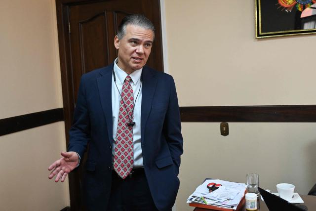 Bolivia's Vice Minister of Social Defense and anti-drug czar Ernesto Justiniano speaks during an interview with AFP in La Paz on April 1, 2026. Bolivia resumes joint investigations into drug trafficking cases with the US Drug Enforcement Administration (DEA) after an 18-year absence, anti-drug czar Ernesto Justiniano told AFP on April 1, 2026. (Photo by Aizar RALDES / AFP)
