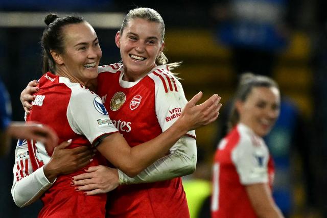 Arsenal's Australian striker #19 Caitlin Foord and Arsenal's English striker #23 Alessia Russo celebrate following the UEFA Women's Champions League Quarter Final second-leg football match between Chelsea and Arsenal at Stamford Bridge in London on April 1, 2026. (Photo by Ben STANSALL / AFP)