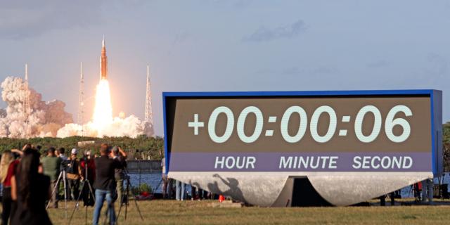 The Artemis II crewed lunar mission launches at Kennedy Space Center in Cape Canaveral, Florida, on April 1, 2026. Four astronauts blasted off aboard a massive NASA rocket April 1 on a long-anticipated journey around the Moon, the first crewed lunar flyby in more than 50 years. With an intense roar that reverberated far beyond the launchpad, the enormous orange-and-white rocket carried three Americans and one Canadian away from Florida's Kennedy Space Center at approximately 6:35 pm local time, according to an AFP journalist onsite. "We're going to the Moon!" yelled a spectator. (Photo by Gregg Newton / AFP)