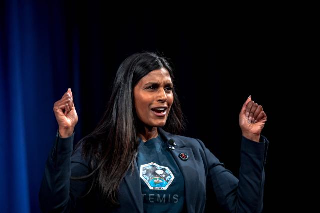 Principal Engineer of Program and Projects Management of the Canadian Space Agency (CSA) Kumudu Jinadasa talks about the Artemis II lunar mission to attendees of a viewing party of the Artemis II launch, in Longueuil, near Montreal, Quebec, on April 1, 2026. Four astronauts blasted off aboard a massive NASA rocket April 1 on a long-anticipated journey around the Moon, the first crewed lunar flyby in more than 50 years. With an intense roar that reverberated far beyond the launchpad, the enormous orange-and-white rocket carried three Americans and one Canadian away from Florida's Kennedy Space Center at approximately 6:35 pm local time, according to an AFP journalist onsite. "We're going to the Moon!" yelled a spectator. (Photo by ANDREJ IVANOV / AFP)