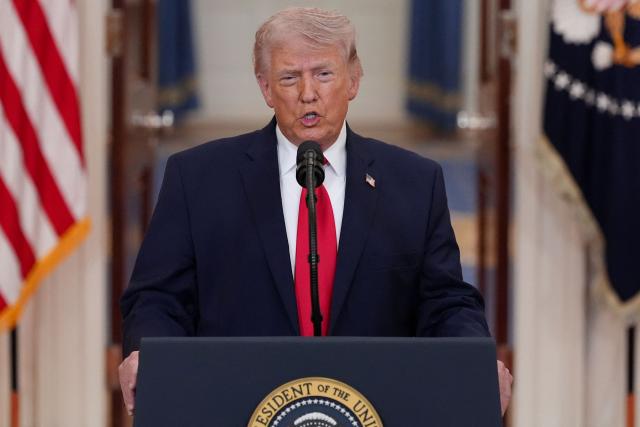 US President Donald Trump speaks during a televised address on the conflict in the Middle East from the Cross Hall of the White House on April 1, 2026, in Washington. (Photo by Alex Brandon / POOL / AFP)