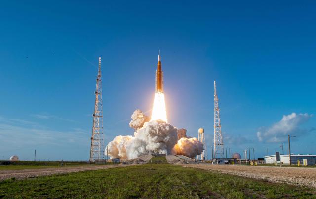 The Artemis II crewed lunar mission lifts off from Pad 39B at Kennedy Space Center in Cape Canaveral, Florida, on April 1, 2026. Four astronauts blasted off aboard a massive NASA rocket April 1 on a long-anticipated journey around the Moon, the first crewed lunar flyby in more than 50 years. With an intense roar that reverberated far beyond the launchpad, the enormous orange-and-white rocket carried three Americans and one Canadian away from Florida's Kennedy Space Center at approximately 6:35 pm local time, according to an AFP journalist onsite. "We're going to the Moon!" yelled a spectator. (Photo by Jim Watson / AFP)