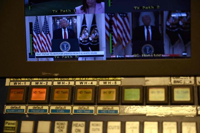 The televised address of US President Donald Trump is seen at the James Brady Press Briefing Room of the White House in Washington, DC on April 1, 2026. (Photo by Brendan SMIALOWSKI / AFP)