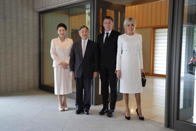 France's President Emmanuel Macron (2nd-R) and First Lady Brigitte Macron (R) pose with Japan's Emperor Naruhito (2nd-L) and Empress Masako (L) at the  Imperial Palace in Tokyo on April 2, 2026. (Photo by Ludovic MARIN / POOL / AFP)