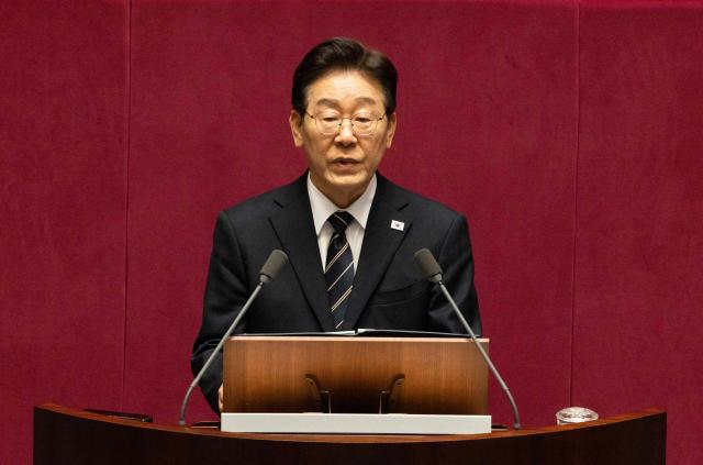 South Korean President Lee Jae Myung delivers a speech on the government's first supplemetary budget bill of 2026 at the National Assembly in Seoul on April 2, 2026. (Photo by JEON HEON-KYUN / POOL / AFP)