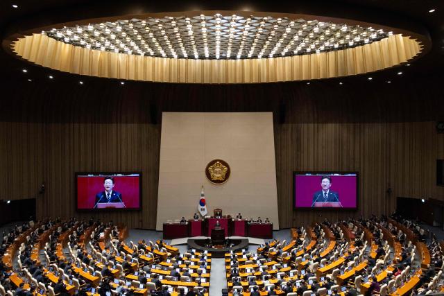 South Korean President Lee Jae Myung delivers a speech on the government's first supplemetary budget bill of 2026 at the National Assembly in Seoul on April 2, 2026. (Photo by JEON HEON-KYUN / POOL / AFP)