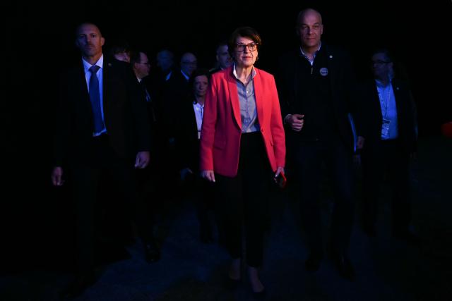French Minister of Agriculture and Food Sovereignty Annie Genevard (2ndR) and FNSEA (French National Federation of Farmers' Unions) president Arnaud Rousseau (R) arrive to attend the 80th Congress of the FNSEA at the Exhibition Park in Caen on April 2, 2026. (Photo by LOU BENOIST / AFP)