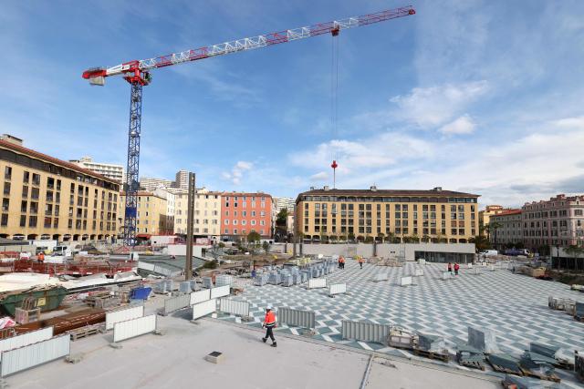 This photograph shows a general view of the Charles de Gaulle Square as workers operate as part of its renovation in Ajaccio, on the French Mediterranean island of Corsica on April 2, 2026. (Photo by Pascal POCHARD-CASABIANCA / AFP)