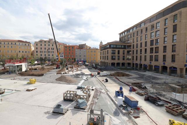 This photograph shows a general view of the Charles de Gaulle Square as workers operate as part of its renovation in Ajaccio, on the French Mediterranean island of Corsica on April 2, 2026. (Photo by Pascal POCHARD-CASABIANCA / AFP)