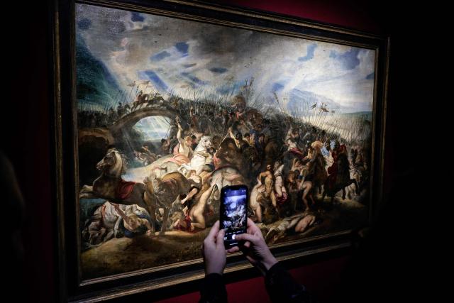 This photograph shows a partial view of the painting entitled "La bataille des Amazones" by artist Pierre Paul Rubens ahead of its auction at Hotel Drouot auction house in Paris on April 2, 2026. (Photo by STEPHANE DE SAKUTIN / AFP)