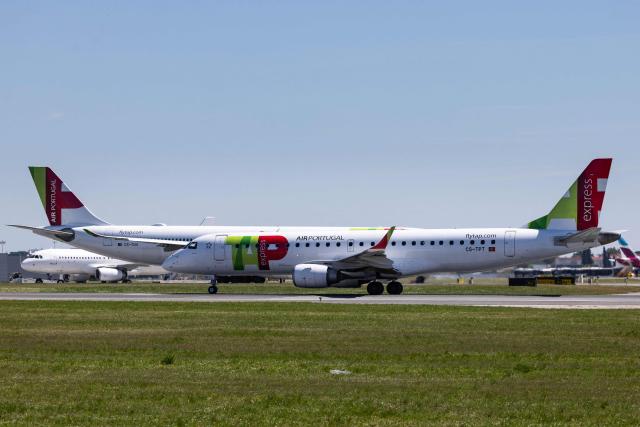 TAP Air Portugal aircrafts prepare to take off at Humberto Delgado Airport in Lisbon on April 2, 2025. Air France-KLM said April 2, 2026 it had submitted an offer to take a minority stake in TAP Air Portugal, which is in the process of being privatised by the Portuguese government. (Photo by HENRIQUE CASINHAS / AFP)