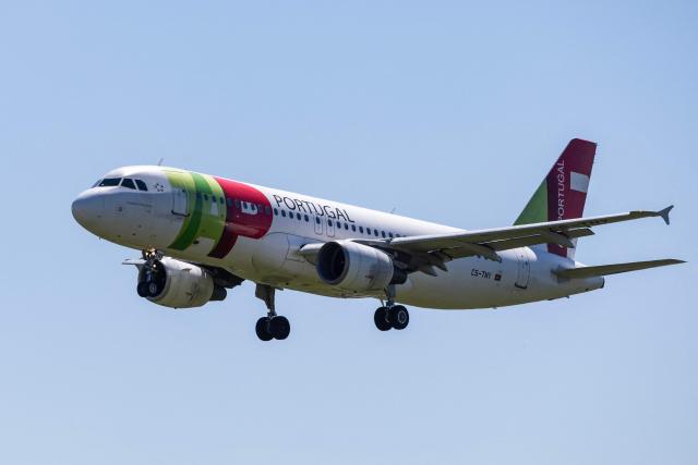 A TAP Air Portugal aircraft prepares to land at Humberto Delgado Airport in Lisbon on April 2, 2025. Air France-KLM said April 2, 2026 it had submitted an offer to take a minority stake in TAP Air Portugal, which is in the process of being privatised by the Portuguese government. (Photo by HENRIQUE CASINHAS / AFP)
