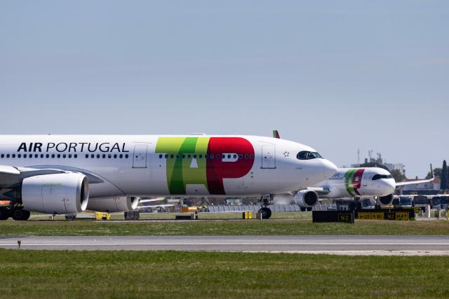 A TAP Air Portugal aircraft prepares to take off at Humberto Delgado Airport in Lisbon on April 2, 2025. Air France-KLM said April 2, 2026 it had submitted an offer to take a minority stake in TAP Air Portugal, which is in the process of being privatised by the Portuguese government. (Photo by HENRIQUE CASINHAS / AFP)