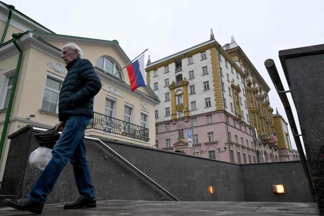 A man walks past the US Embassy in Moscow on April 2, 2026. (Photo by Igor IVANKO / AFP)