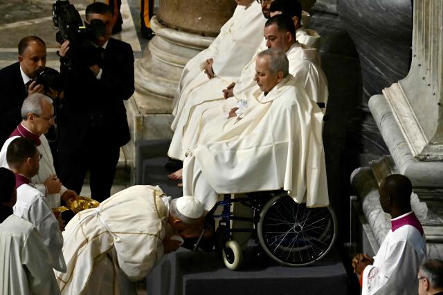 Pope Leo XIV performs the "Washing of the Feet" during the mass of the Lord’s Supper at St. John Lateran archbasilica in Rome, on April 2, 2026. (Photo by Filippo MONTEFORTE / AFP)