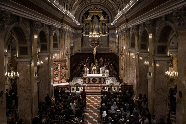 Congregants gather during the Maundy Thursday’s Washing of the Feet ceremony at the Christ the Saviour Church in the old city of Jerusalem on April 2, 2026. Holy sites in Jerusalem's old city have remained closed for security reasons since the outbreak of the Middle East war on February 28, when Israel and the US launched strikes on Iran. (Photo by MARCO LONGARI / AFP)