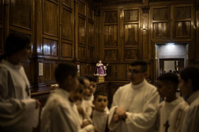 Altar boys gather ahead of the Maundy Thursday’s Washing of the Feet ceremony at the Christ the Saviour Church in the old city of Jerusalem on April 2, 2026. Holy sites in Jerusalem's old city have remained closed for security reasons since the outbreak of the Middle East war on February 28, when Israel and the US launched strikes on Iran. (Photo by MARCO LONGARI / AFP)