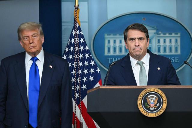 (FILES) US President Donald Trump looks on as Deputy Attorney General Todd Blanche (R) speaks during a news conference in the Brady Briefing Room of the White House on June 27, 2025, in Washington, DC. US media reported on April 2, 2026, that US President Donald Trump has fired Attorney General Pam Bondi.  CNN and other US outlets said Deputy Attorney General Todd Blanche, Trump's former personal lawyer, would serve as acting attorney general. (Photo by ANDREW CABALLERO-REYNOLDS / AFP)