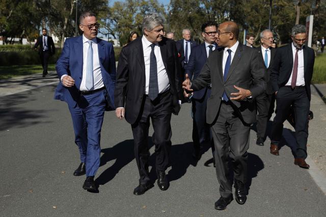 President of the Royal Moroccan Football Federation Fouzi Lekjaa (L), France’s junior Minister in charge of external trade Nicolas Forissier (C) and President of the French Football Federation Philippe Diallo (R) arrive during the first operational meeting of the bilateral support committee for the 2030 World Cup in Salй on April 2, 2026. (Photo by Abdel Majid BZIOUAT / AFP)
