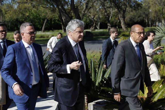 President of the Royal Moroccan Football Federation Fouzi Lekjaa (L), France’s junior Minister in charge of external trade Nicolas Forissier (C) and President of the French Football Federation Philippe Diallo (R) arrive during the first operational meeting of the bilateral support committee for the 2030 World Cup in Salй on April 2, 2026. (Photo by Abdel Majid BZIOUAT / AFP)