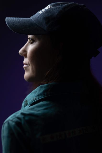 French producer-singer-songwriter of electronic music Cecile Leoge, aka DeLaurentis, poses in her music studio at home during a photo session in Paris, on March 31, 2026. (Photo by Joel Saget / AFP)