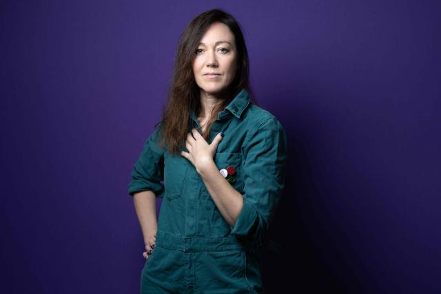 French producer-singer-songwriter of electronic music Cecile Leoge, aka DeLaurentis, poses in her music studio at home during a photo session in Paris, on March 31, 2026. (Photo by Joel Saget / AFP)