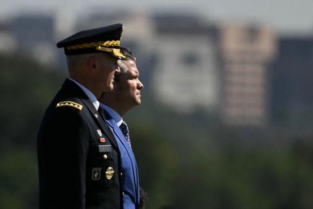 (FILES) US Secretary of Defense Pete Hegseth (R) and US Army Chief of Staff General Randy George attend the 2025 National POW/MIA Recognition Day ceremony at the Pentagon in Washington, DC on September 19, 2025. Secretary of Defense Pete Hegseth has asked General Randy George to step down as chief of staff of the US Army, a US official said on April 2. The official confirmed a report from US broadcaster CBS which said George had been asked to take immediate retirement. (Photo by Jim WATSON / AFP)