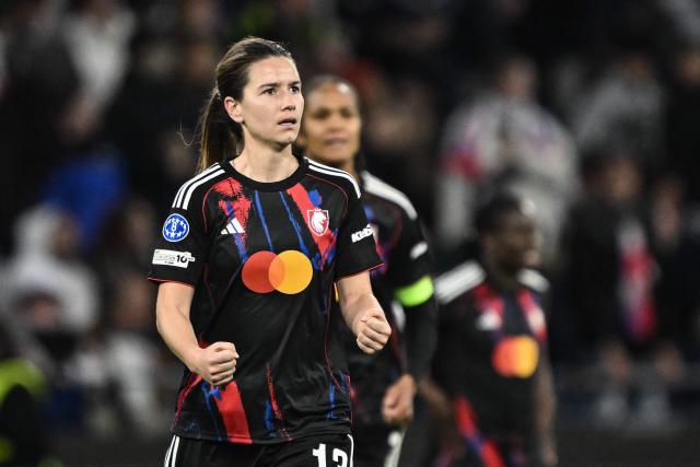 Lyon's Dutch midfielder #13 Damaris Egurrola celebrates scoring her team's third goal during the UEFA Women's Champions League quarter final second leg football match between OL Lyonnes (Lyon) and VfL Wolfsburg at the Groupama stadium in Decines-Charpieu, central-eastern France, on April 2, 2026. (Photo by JEFF PACHOUD / AFP)