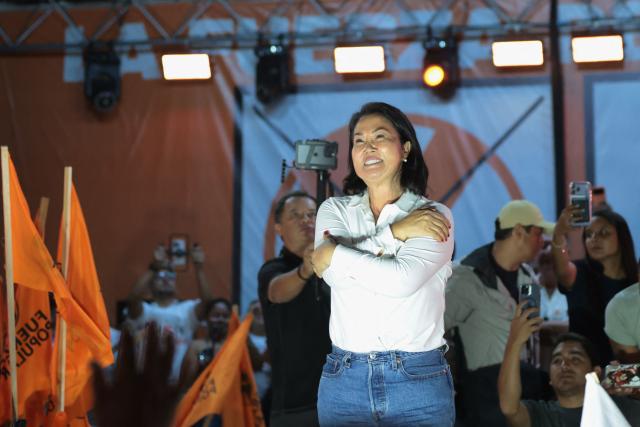 Peru's presidential candidate Keiko Fujimori, for the Fuerza Popular party, gestures to supporters during a campaign rally at the Peru-Korea Esplanade in the Ventanilla district, Peru on April 2, 2026. Peru will hold presidential elections on April 12. (Photo by Connie FRANCE / AFP)