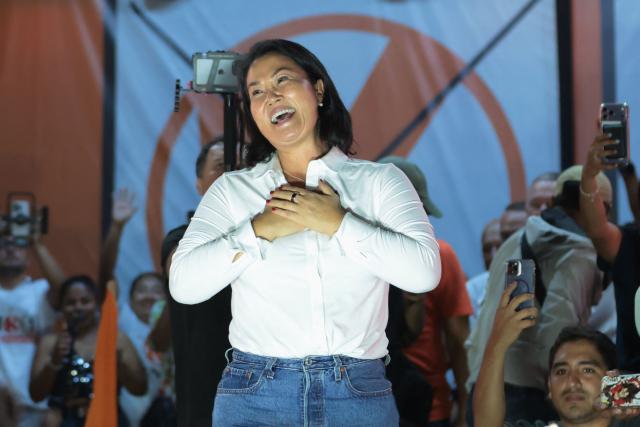 Peru's presidential candidate Keiko Fujimori, for the Fuerza Popular party, gestures to supporters during a campaign rally at the Peru-Korea Esplanade in the Ventanilla district, Peru on April 2, 2026. Peru will hold presidential elections on April 12. (Photo by Connie FRANCE / AFP)