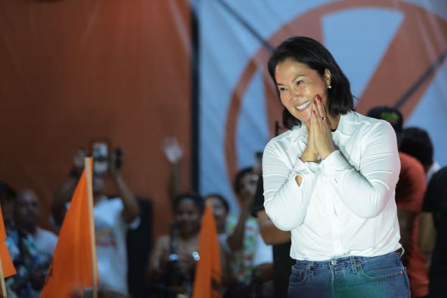 TOPSHOT - Peru's presidential candidate Keiko Fujimori, for the Fuerza Popular party, gestures to supporters during a campaign rally at the Peru-Korea Esplanade in the Ventanilla district, Peru on April 2, 2026. Peru will hold presidential elections on April 12. (Photo by Connie FRANCE / AFP)
