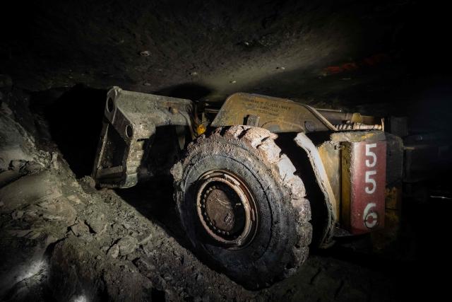 Miners use heavy machines to work more than 1,000 meters underground at the Polkowice–Sieroszowice copper and silver mine in southwestern Poland, owned by KGHM, the country's metallurgical giant, on March 25, 2026. Thousands of meters beneath the ground, amid suffocating heat, lies one of the keys to Poland's rumbling mining sector -- and the world economy. (Photo by Wojtek RADWANSKI / AFP)