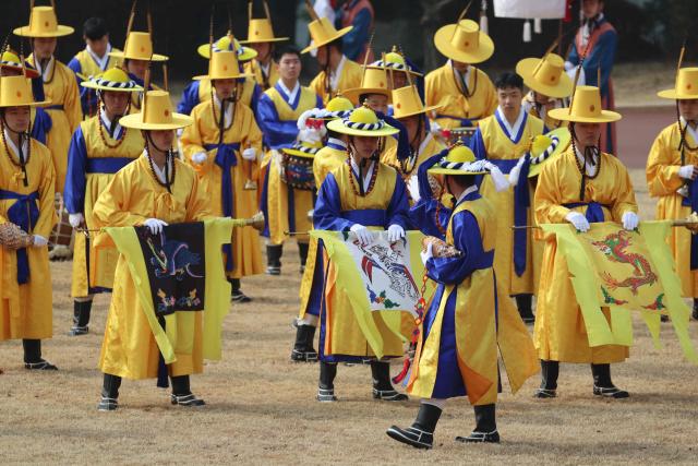 Members of the South Korean Presidential Guard of Honor participate in the official welcoming ceremony for French President Emmanuel Macron at the Blue House in Seoul on April 3, 2026. (Photo by Ludovic MARIN / AFP)
