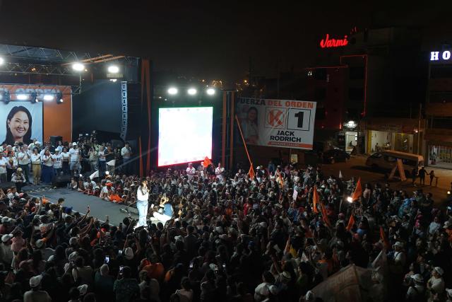 This aerial view shows Peru's presidential candidate Keiko Fujimori, for the Fuerza Popular party, speaking to supporters during a campaign rally at the Peru-Korea Esplanade in the Ventanilla district, Peru on April 2, 2026. Peru will hold presidential elections on April 12. (Photo by Connie FRANCE / AFP)