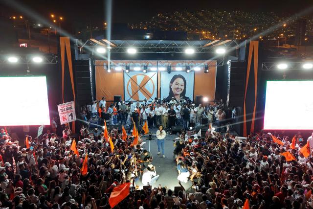 This aerial view shows Peru's presidential candidate Keiko Fujimori, for the Fuerza Popular party, speaking to supporters during a campaign rally at the Peru-Korea Esplanade in the Ventanilla district, Peru on April 2, 2026. Peru will hold presidential elections on April 12. (Photo by Connie FRANCE / AFP)