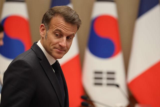 French President Emmanuel Macron arrives to attend a bilateral meeting with South Korean President Lee Jae Myung (not pictured) in Seoul on April 3, 2026. (Photo by Ludovic MARIN / AFP)
