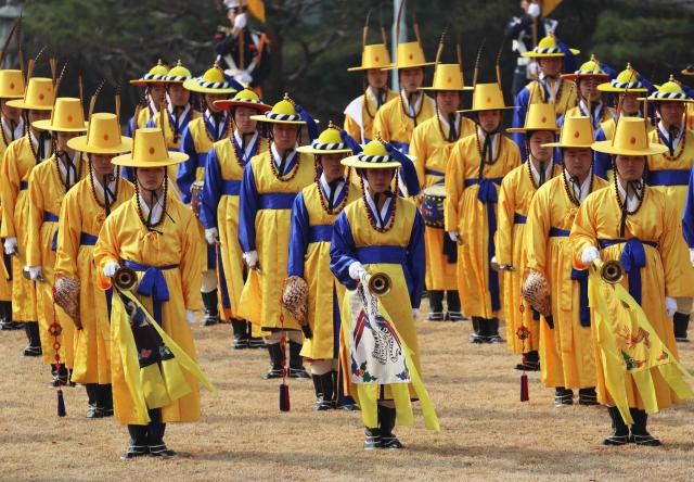 Members of the South Korean Presidential Guard of Honor participate in the official welcoming ceremony for French President Emmanuel Macron at the Blue House in Seoul on April 3, 2026. (Photo by Ludovic MARIN / AFP)