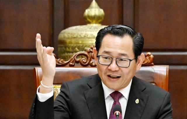 Cambodian justice minister Koeut Rith speaks during a press conference at Minitry of Justice in Phnom Penh on April 3, 2026. Fraudsters running cyberscam operations in Cambodia could face life in prison after the Senate approved a new law on April 3, targeting criminals involved in the multibillion-dollar illicit industry. (Photo by TANG CHHIN Sothy / AFP)