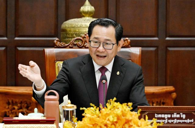 Cambodian justice minister Koeut Rith speaks during a press conference at Minitry of Justice in Phnom Penh on April 3, 2026. Fraudsters running cyberscam operations in Cambodia could face life in prison after the Senate approved a new law on April 3, targeting criminals involved in the multibillion-dollar illicit industry. (Photo by TANG CHHIN Sothy / AFP)