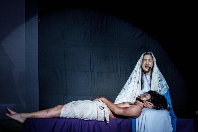 Catholics take part in a reenactment of the Passion of Christ on Good Friday at St. Bonaventura Church in Jakarta on April 3, 2026, as Christian devotees mark the Holy Week in Indonesia, a predominantly Muslim nation. (Photo by Yasuyoshi Chiba / AFP)